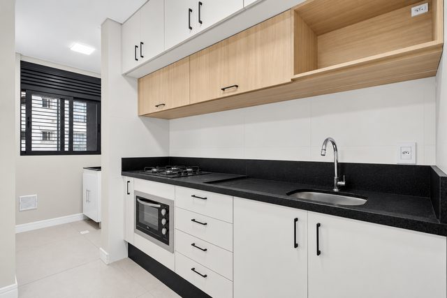 Foto 1 de Apartamento semimobiliado com 2 quartos sendo uma suíte para alugar no Centro, Itajaí