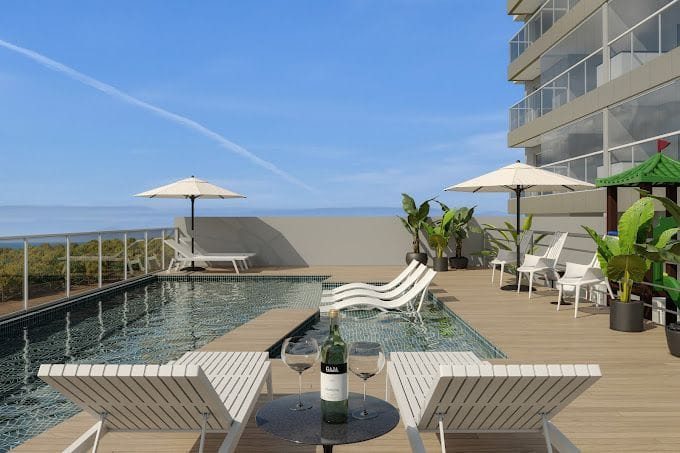 Foto 3 de Apartamento frente mar com 1 suíte + 2 demisuítes à venda, 110 m² - Centro - Navegantes/SC