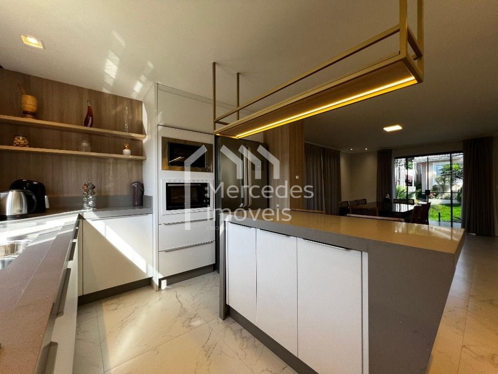Foto 10 de Casa 3 suítes + 1 dorm à venda · Ariribá, Balneário Camboriú