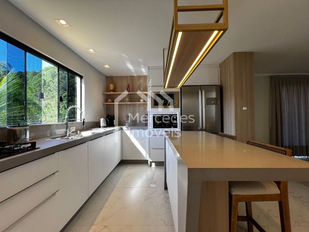 Foto 7 de Casa 3 suítes + 1 dorm à venda · Ariribá, Balneário Camboriú