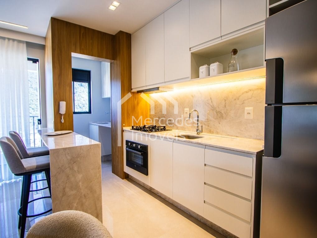 Foto 4 de Apartamento 2 suítes à venda · Fazenda, Itajaí · LAGO MORAINE · 73 m²