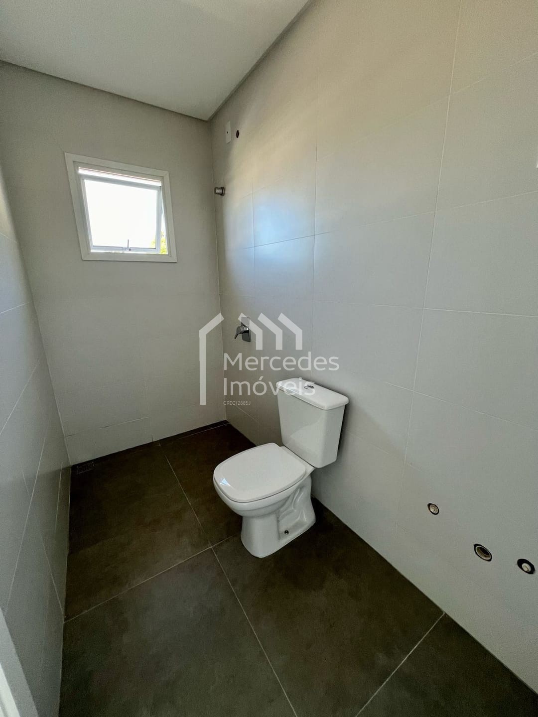 Foto 4 de Sobrado 1 suíte + 2 dorms à venda · Espinheiros, Itajaí · 109 m² · SO0069