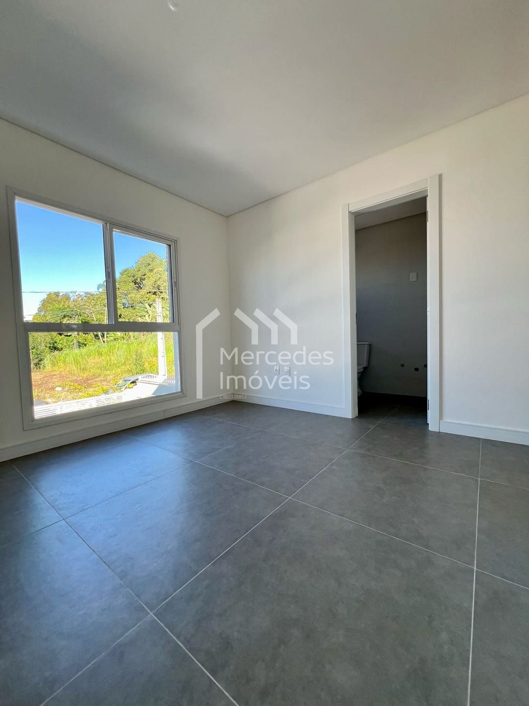 Foto 5 de Sobrado 1 suíte + 2 dorms à venda · Espinheiros, Itajaí · 109 m² · SO0069
